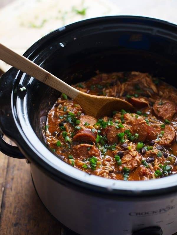 Crockpot Creole Chicken and Sausage - 10 minute prep for this hearty dinner, made healthier with beans and peppers. 300 calories. | pinchofyum.com