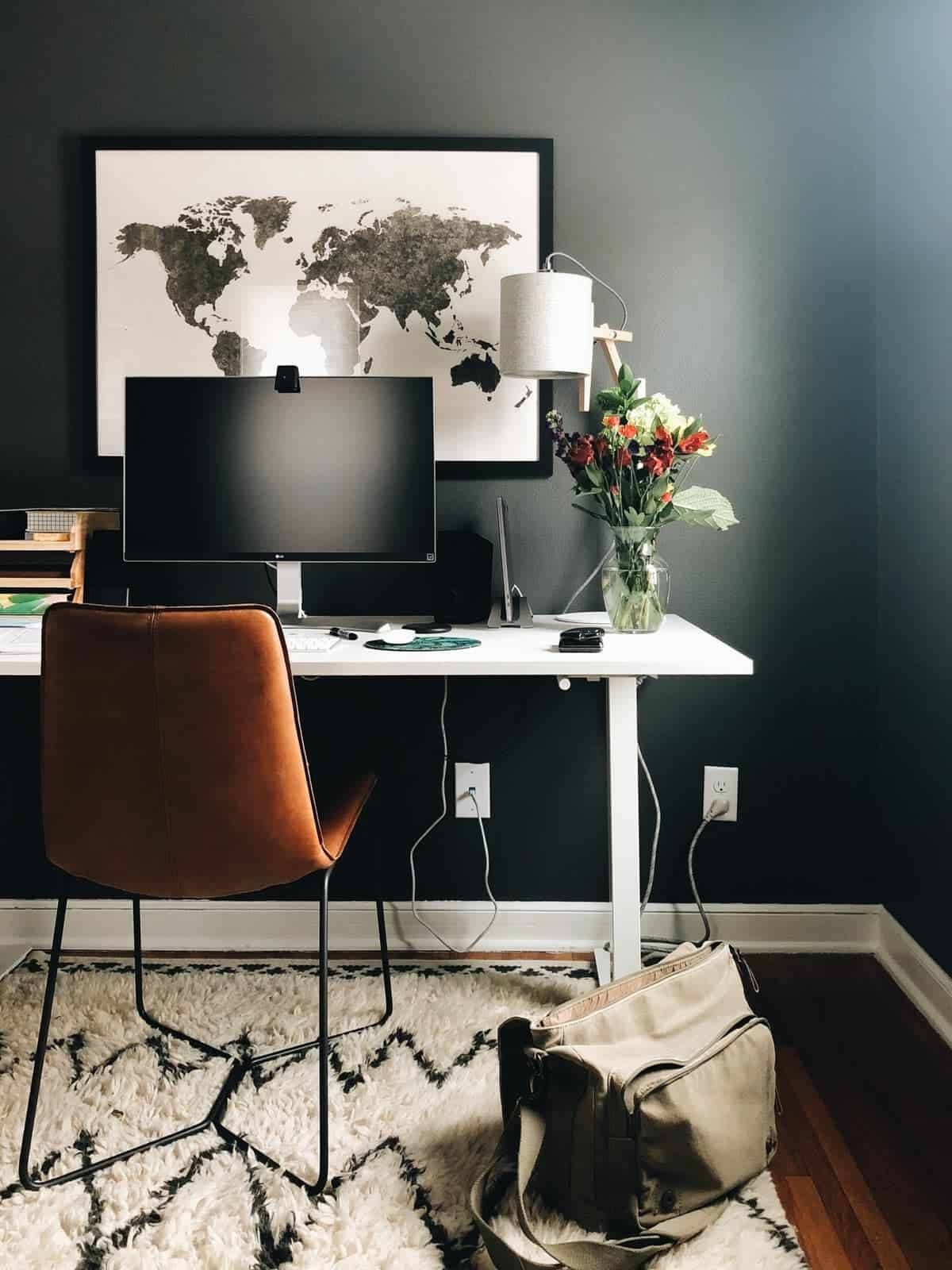 Office setup with leather chair and desk.