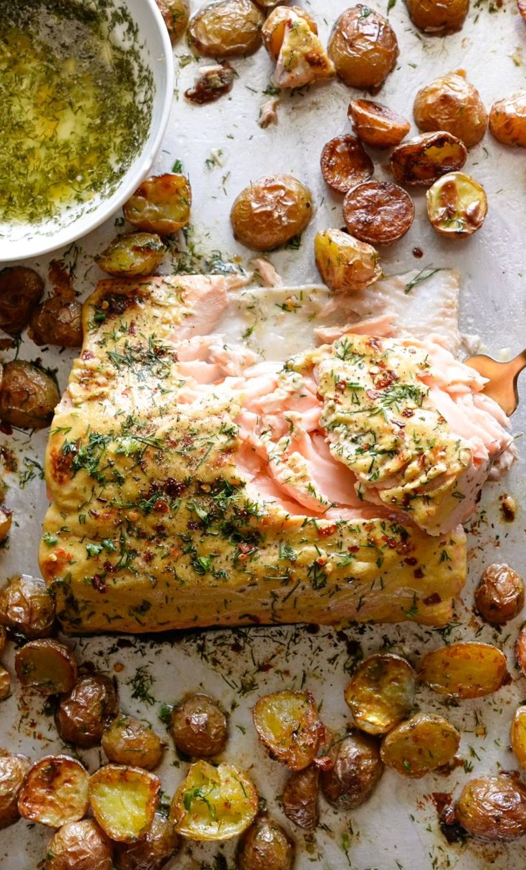 Sheet pan salmon with potatoes and dill.